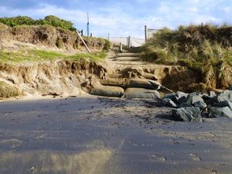 Car Park beach access 23/06/2015: Past dune erosion has been most severe at the car park beach access [Near Pole 2] and sandbags were installed as a result. The sandbags are proving a success in protecting the dune at this point and keeping the access open.