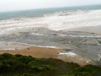 River Mouth, Photo 2: Floodwaters meeting ocean swell 
