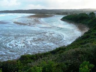 Swell entering river mouth